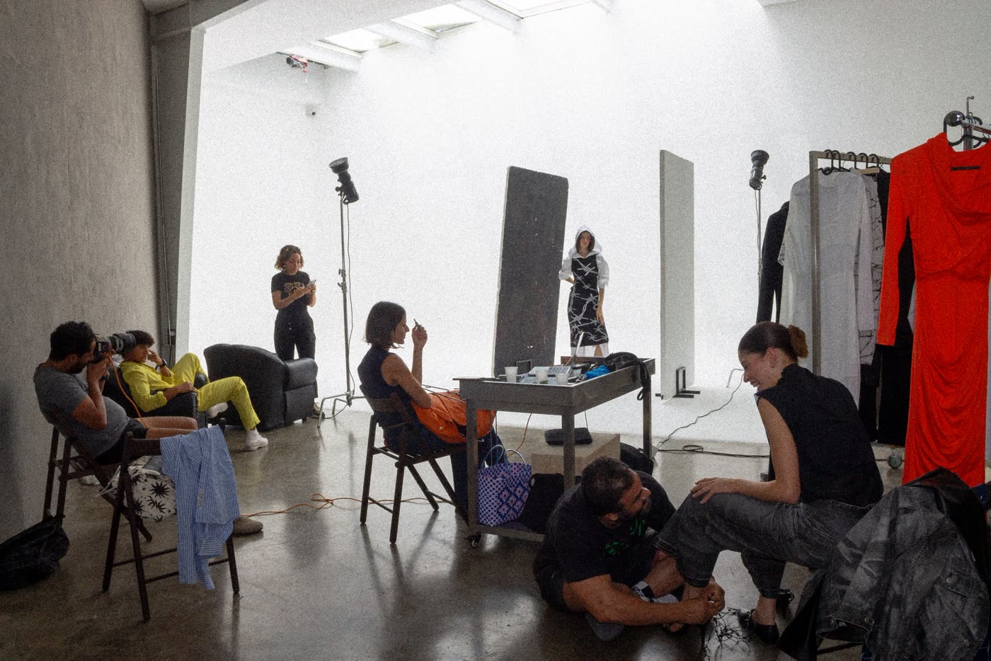 The crew, rails and model in the white studio