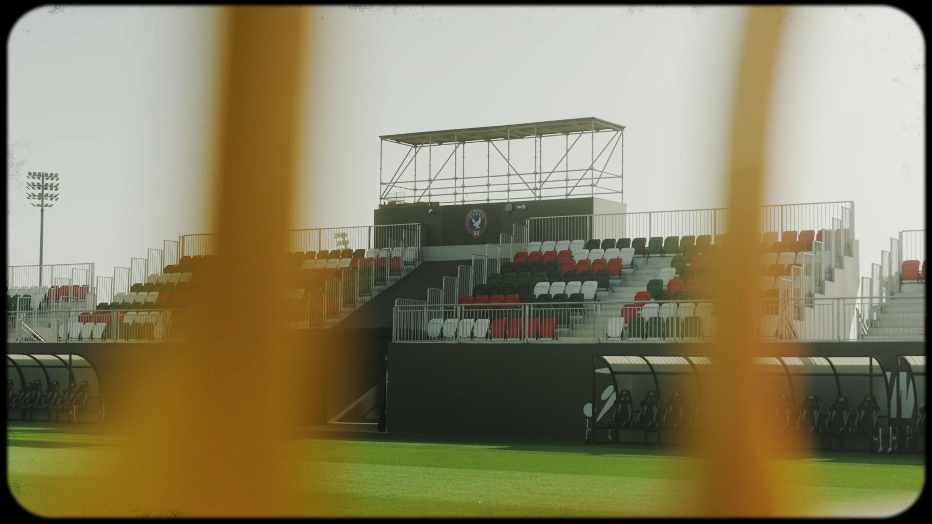 Stadium stand seen through a blurred foreground